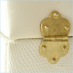 Petite, ivory leather evening bag with reptile print 