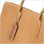 Cashin tote bag styled after a plain, brown shopping bag