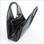 Dome-shaped black leather bag