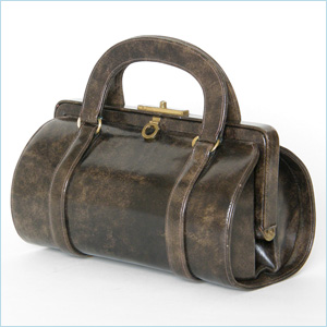 brown leather barrel bag